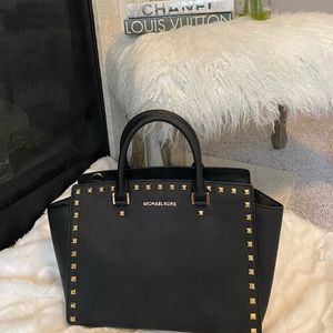 Michael Kors Handbag.  Black with gold studs.